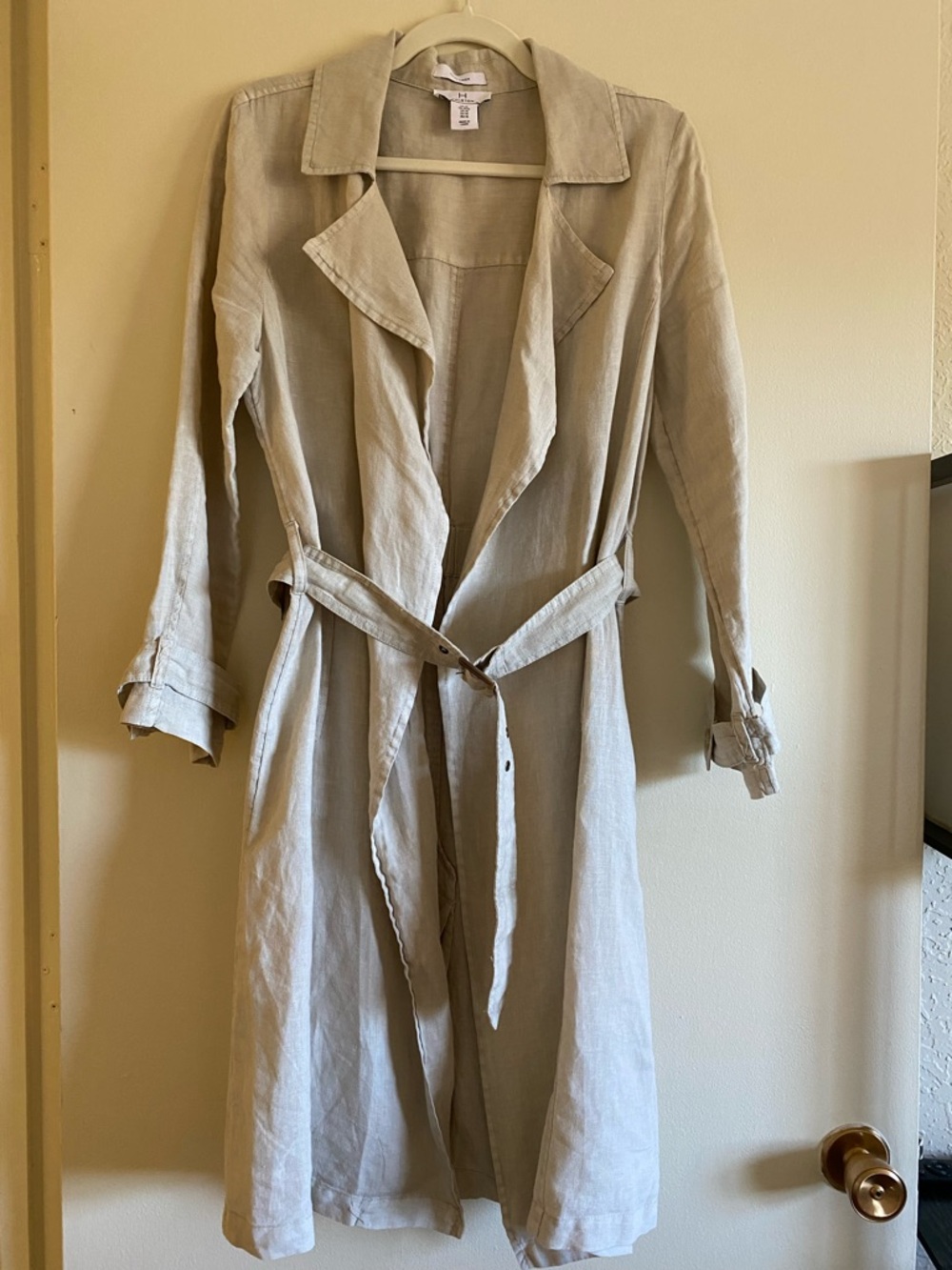 Halston’s linen trenchcoat